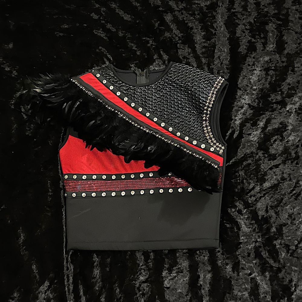 Black and red vest with feathers